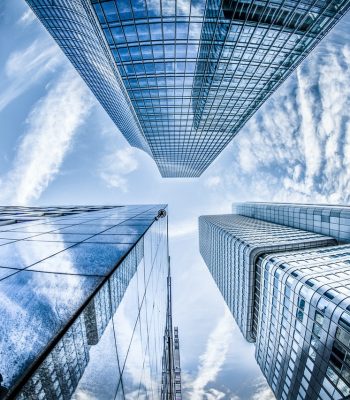 low-angle-photo-of-four-high-rise-curtain-wall-buildings-830891 (1)