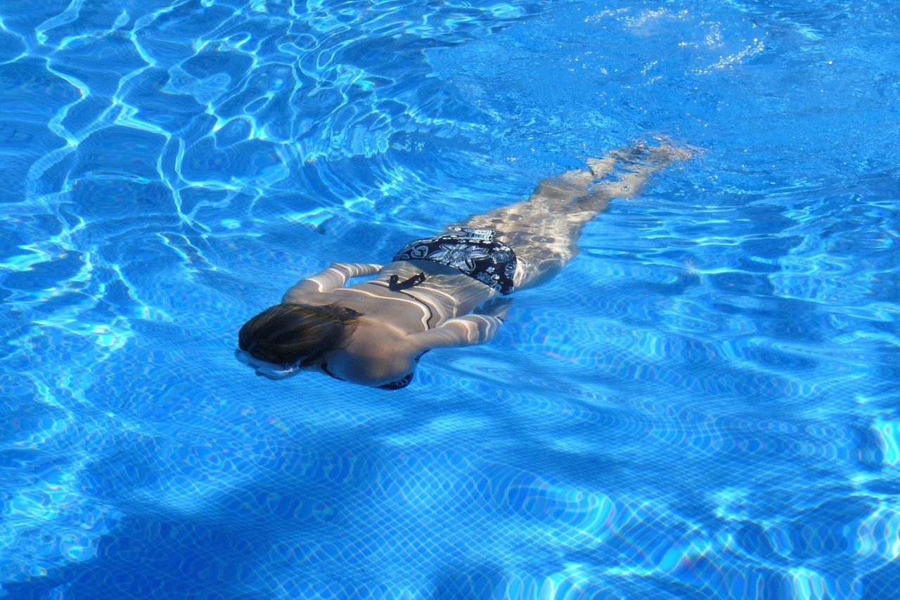 women-swimming-on-the-pool-52988